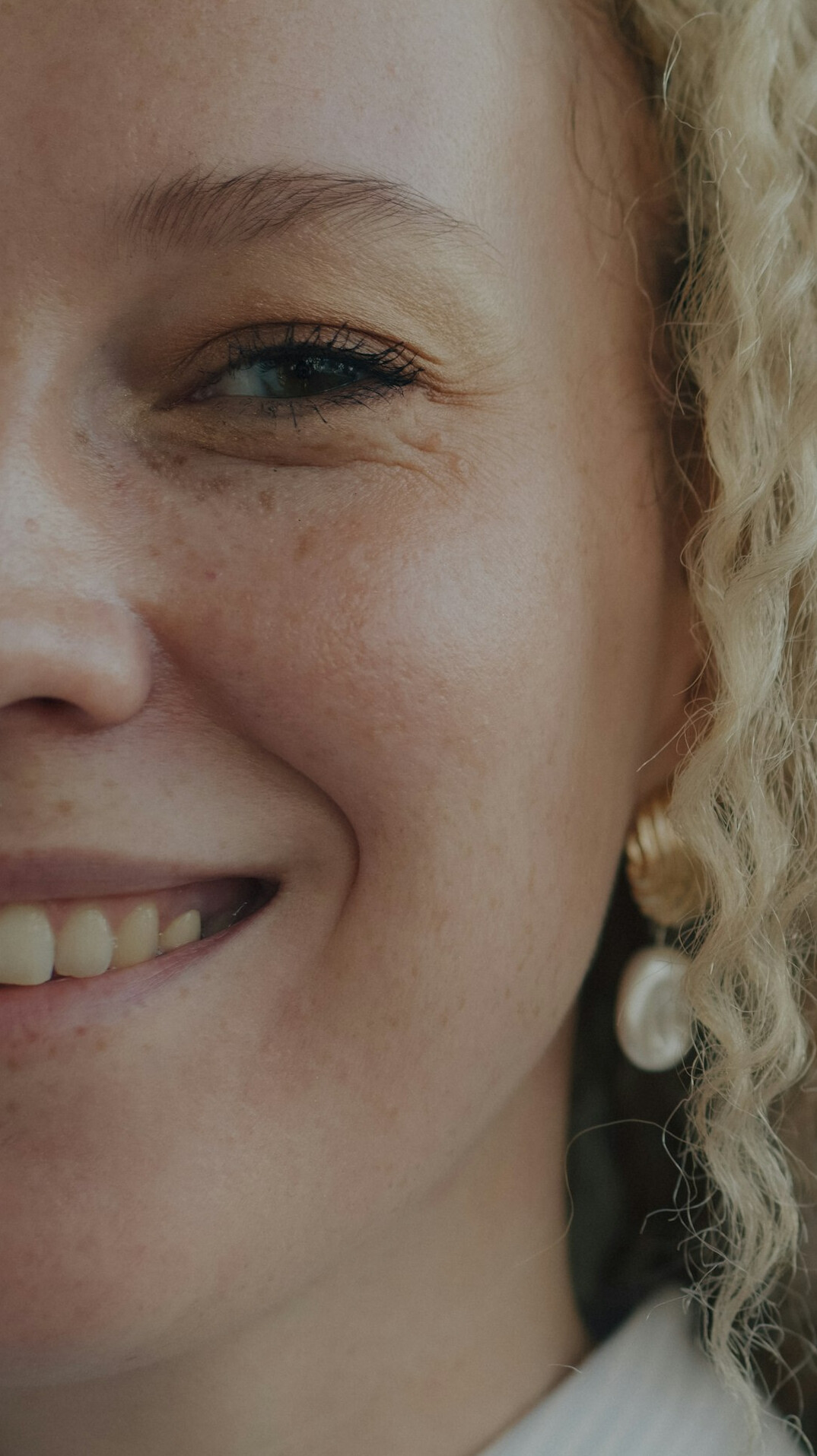 Headshot of a smiling European businesswoman